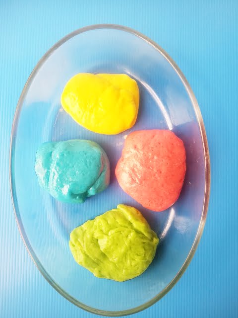 Make Rainbow Edible Slime today. This easy edible slime recipe uses marshmallows. The colorful marshmallows give this slime its pretty Rainbow colors. Sure to be a favorite of everyone! #rainbowslime #edibleslime #slime 